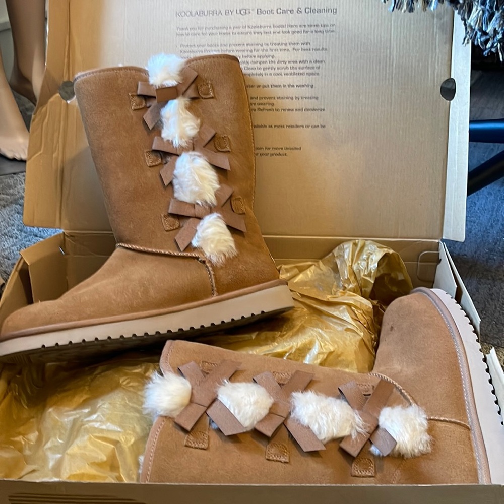 Ugg Koolaburra fleece lined suede boots.